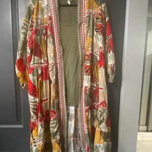 Duster jacket vibrant colors and a long sleeve T-shirt that matches